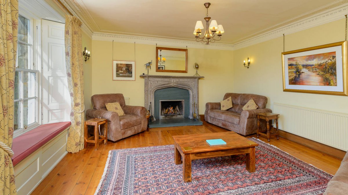 Cosy Living Room with working fireplace